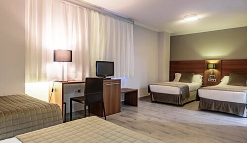 Triple Room (+ Extra bed adult)