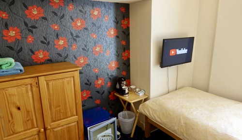 Single Room, Shared Bathroom