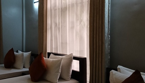 Deluxe Triple Room, Balcony, Garden View