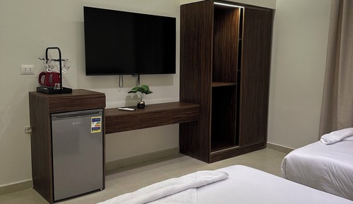 Deluxe Quadruple Room, City View