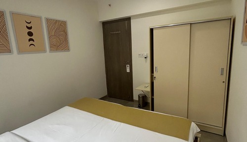 Executive Queen (with attached washroom) in a 2BHK apartment
