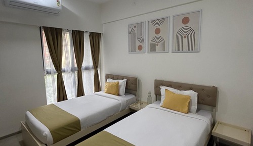 Executive Twin (with attached washroom) in a 2BHK apartment