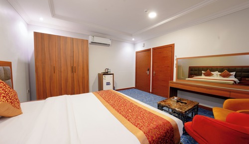 Standard Room ( Bed Room+ Seating area )