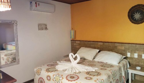 Quarto triplo com varanda