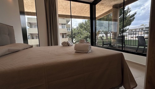 Deluxe Condo, 1 Queen Bed with Sofa bed, Garden View, Garden Area