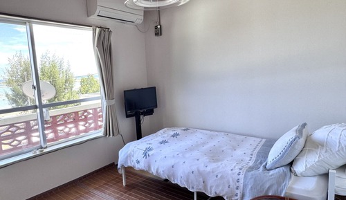 Room 201: Shared Shower & Toilet