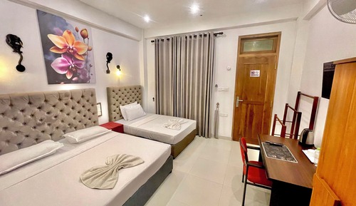 Deluxe Triple Room
