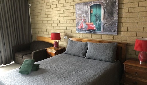 Room 18: Queen Supreme Room with 50 inch Smart TV located on First Floor