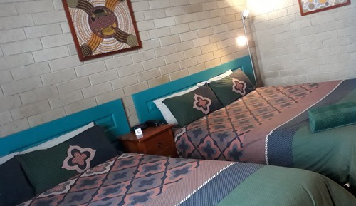 Room 20: Twin Queen Supreme Room with 50 inch Smart TV located on First Floor