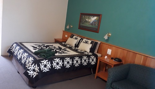 Room 4: Queen Standard Room with 50 inch Smart TV located on Ground Floor