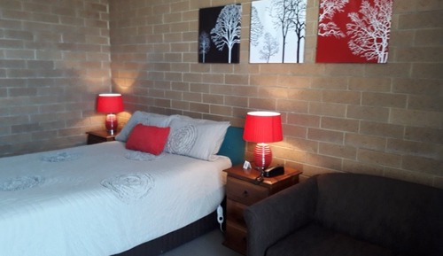 Room 30: Queen Deluxe Room with 50 inch Smart TV located on First Floor