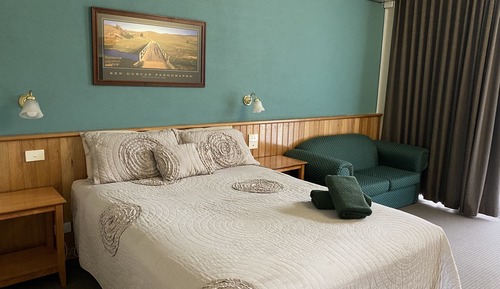 Room 13: Queen Deluxe with 50 inch Smart TV located on Room Ground Floor