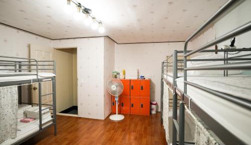 8-Bed Male Dormitory Room