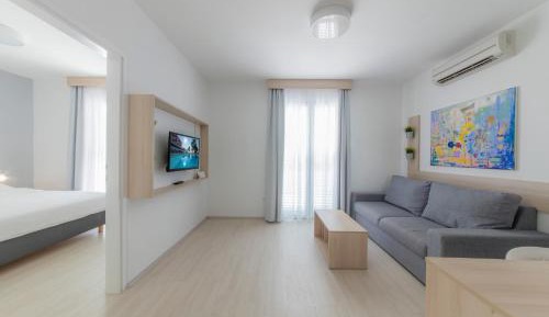 Family  Room with Seaside Balcony