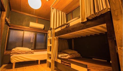 Bed in Japanese-Style Male Dormitory Room