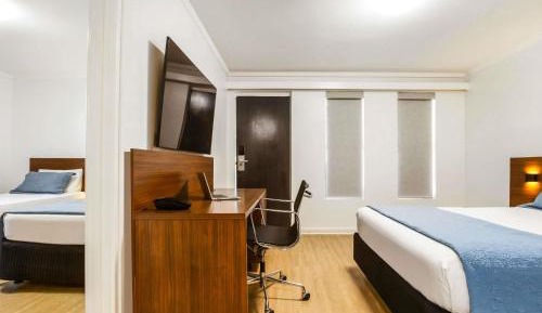 Family Room One Queen and Two Single Beds