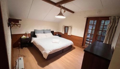 Queen Room with Shared Bathroom