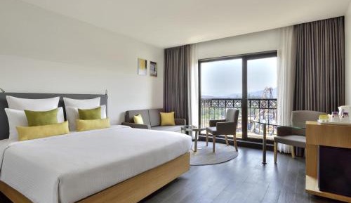 Deluxe King Room with Sofa Bed with Complimentary one free ticket for Trampoline Park at Imagicaa per room per stay and 20% discount on Food and Beverage