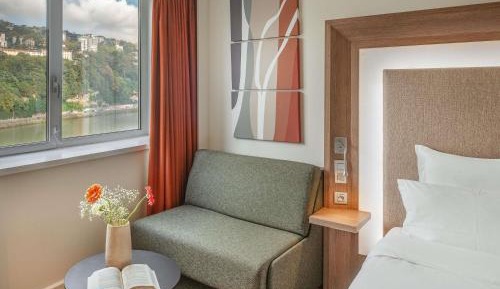 Executive Double Room with Sofa and River View