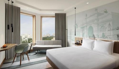 Premier King Bed City View Higher Floor with Complimentary Two Way Airport Transfers, Happy Hours from 6pm to 8pm IMFL Brands at Premier Lounge 