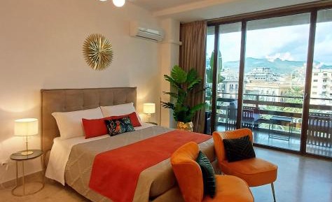 One-Bedroom Apartment with Balcony and City View