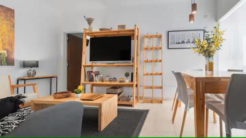 One-Bedroom Apartment with Balcony and City View