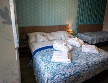 Quadruple Room with Private Bathroom