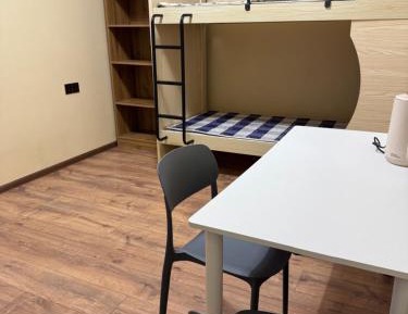 Single Bed in Dormitory Room