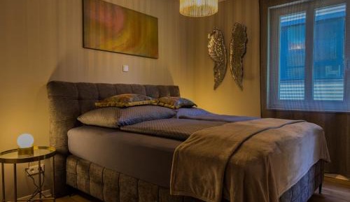 Two-Bedroom Apartment with Balcony