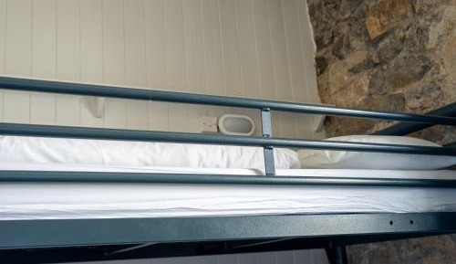 Bunk Bed in Male Dormitory Room with Shared Bathroom