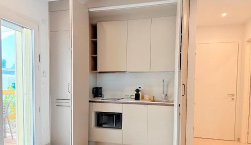 One-Bedroom Apartment with Balcony and Sea View