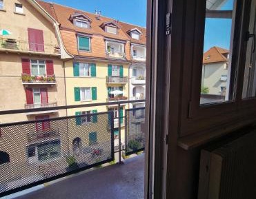 One-Bedroom Apartment with Balcony and City View