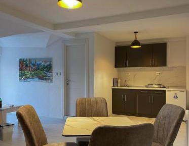 One-Bedroom Apartment with Balcony and City View