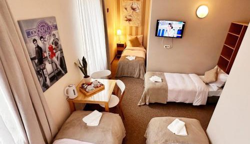 Quadruple Room with Private Bathroom
