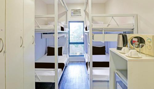 Single Bed in Dormitory Room