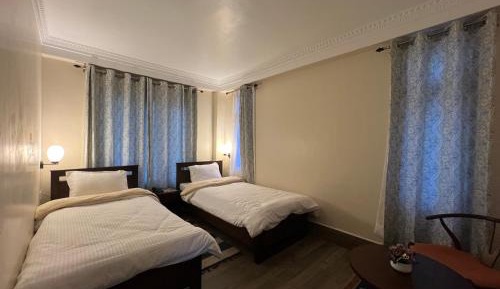 Twin Room with Private Bathroom