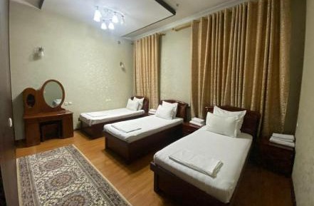 Quadruple Room with Private Bathroom
