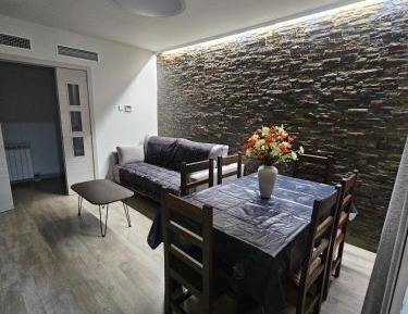 Three-Bedroom Apartment with Balcony