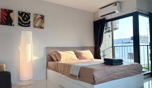 One-Bedroom Apartment with Balcony and City View