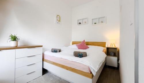 One-Bedroom Apartment with Balcony and City View