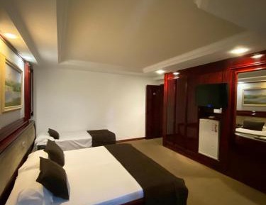 Triple Room (1 Double Bed + 1 Single Bed)