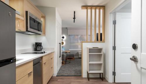 Studio Queen Suite with Two Queen Beds and Sofa Bed