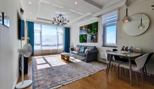 One-Bedroom Apartment with Balcony and Mountain View  