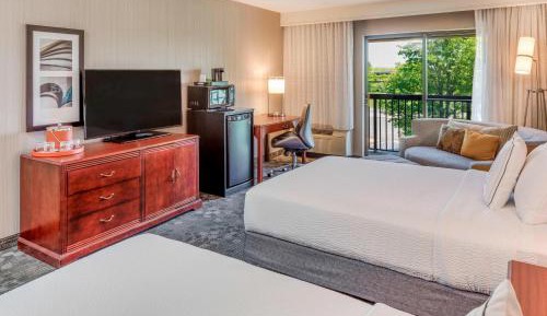 Large Guest Room with Two Double Beds and Sofa Bed