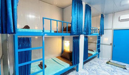 Single Bed in Dormitory Room