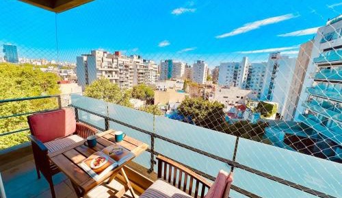 One-Bedroom Apartment with Balcony and City View