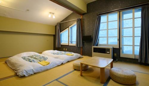 Quadruple Room with Shared Bathroom