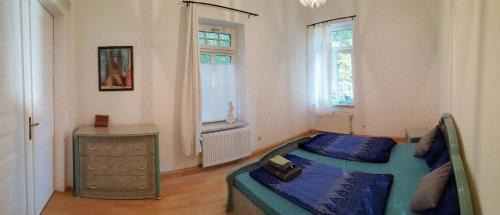 Four-Bedroom Apartment with Balcony 