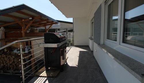 Three-Bedroom Apartment with Balcony