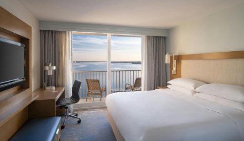1 Bedroom 2 room Suite, 1 King, Sofa Bed, Waterfront View, Balcony 